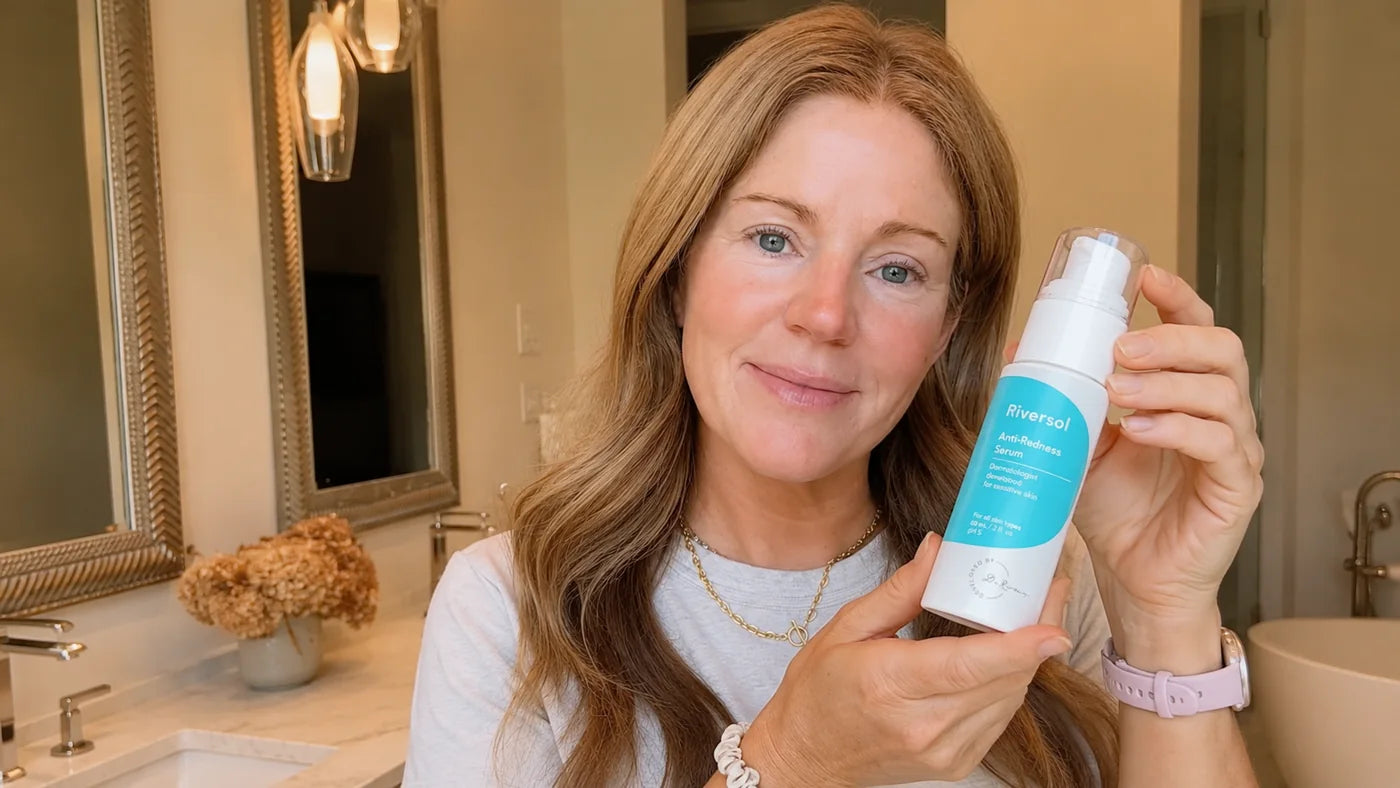 Woman holding Riversol Anti-Redness Serum