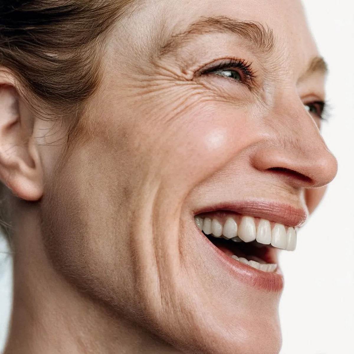 Smiling woman with healthy-looking skin